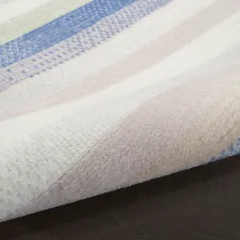 7' X 10' Ivory Tan and Blue Abstract Distressed Non Skid Area Rug