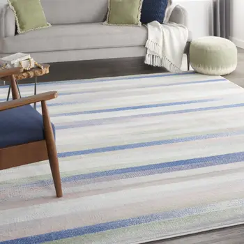 7' X 10' Ivory Tan and Blue Abstract Distressed Non Skid Area Rug