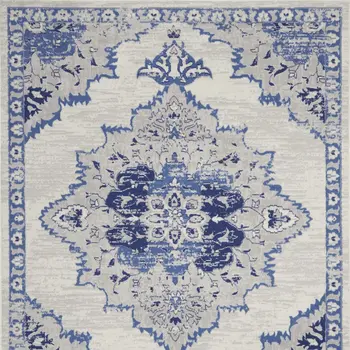 7' X 10' Ivory and Blue Floral Medallion Distressed Non Skid Area Rug