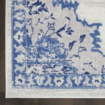 7' X 10' Ivory and Blue Floral Medallion Distressed Non Skid Area Rug