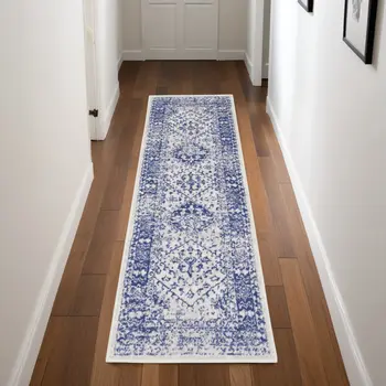 8' Ivory and Navy Blue Geometric Distressed Non Skid Runner Rug