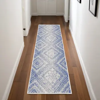 8' Ivory and Blue Geometric Distressed Non Skid Runner Rug