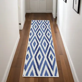 8' Ivory and Blue Geometric Distressed Non Skid Runner Rug