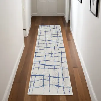 8' Ivory and Blue Abstract Distressed Non Skid Runner Rug