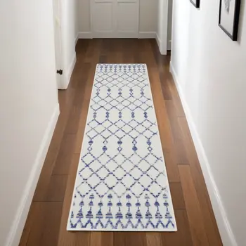 8' Ivory and Blue Geometric Distressed Non Skid Runner Rug