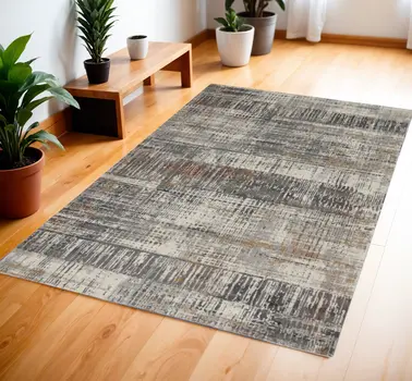 4' X 6' Ivory Gray and Golden Brown Abstract Area Rug