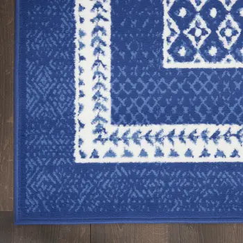 7' X 10' Ivory and Navy Blue Geometric Distressed Non Skid Area Rug