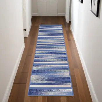 8' Ivory Tan and Blue Abstract Distressed Non Skid Runner Rug