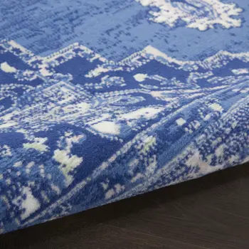 7' X 10' Ivory Navy Blue and Beige Floral Medallion Distressed Non Skid Area Rug