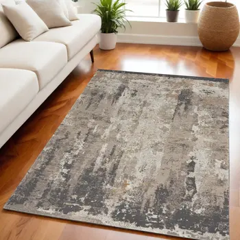 5' X 7' Cream Black and Gray Abstract Area Rug
