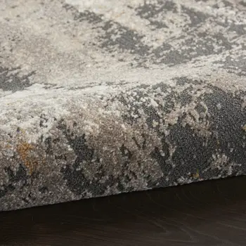 5' X 7' Cream Black and Gray Abstract Area Rug