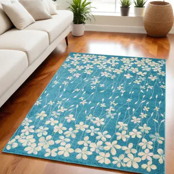 5' X 7' Turquoise and Cream Floral Area Rug