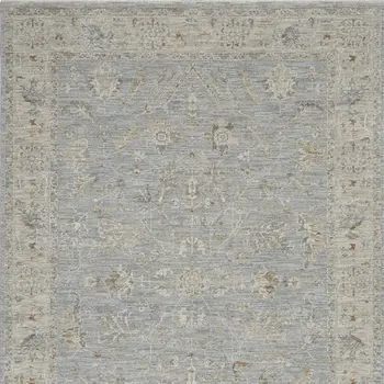 5' X 8' Beige and Blue Floral Power Loom Area Rug