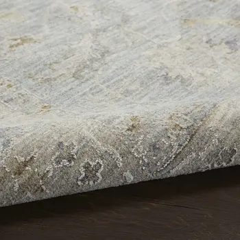 5' X 8' Beige and Blue Floral Power Loom Area Rug