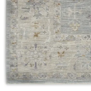 5' X 8' Beige and Blue Floral Power Loom Area Rug