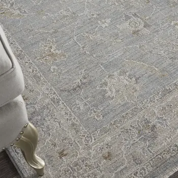5' X 8' Beige and Blue Floral Power Loom Area Rug
