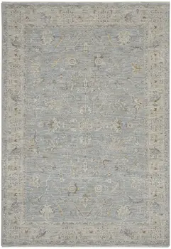 5' X 8' Beige and Blue Floral Power Loom Area Rug