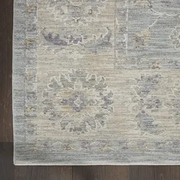 5' X 8' Beige and Blue Floral Power Loom Area Rug