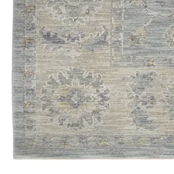 5' X 8' Beige and Blue Floral Power Loom Area Rug