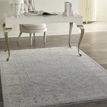 5' X 8' Beige and Blue Floral Power Loom Area Rug