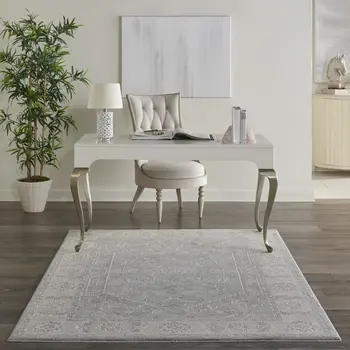 5' X 8' Beige and Blue Floral Power Loom Area Rug