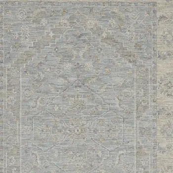 5' X 8' Beige and Blue Floral Power Loom Area Rug
