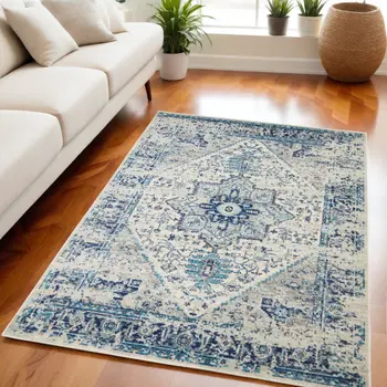 5' X 7' Ivory And Light Blue Floral Medallion Distressed Area Rug