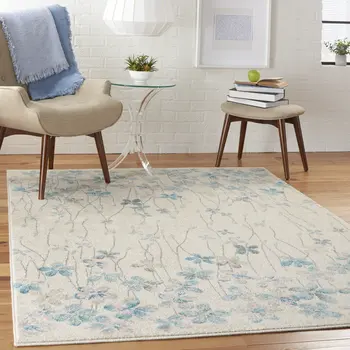 5' X 7' Ivory And Blue Floral Area Rug