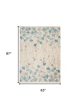 5' X 7' Ivory And Blue Floral Area Rug