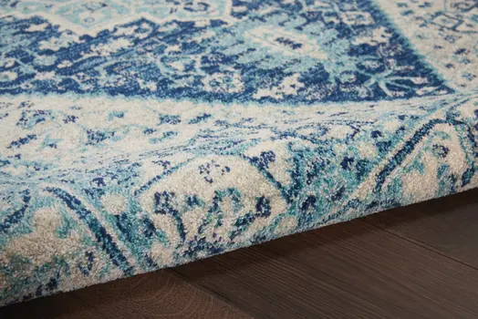 6' X 9' Ivory And Navy Blue Floral Medallion Distressed Area Rug