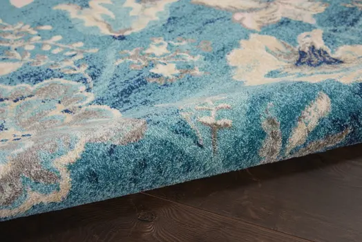 6' X 9' Turquoise Cream and Navy Blue Floral Distressed Area Rug