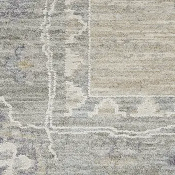 5' X 8' Beige and Gray Floral Power Loom Area Rug