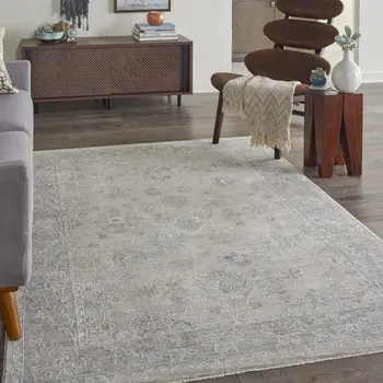 5' X 8' Beige and Gray Floral Power Loom Area Rug