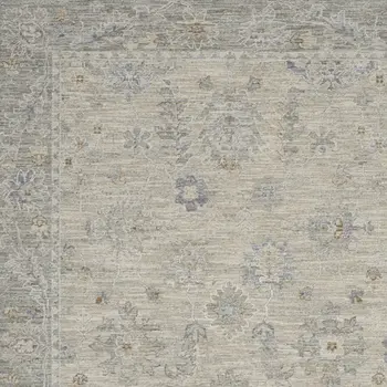 5' X 8' Beige and Gray Floral Power Loom Area Rug