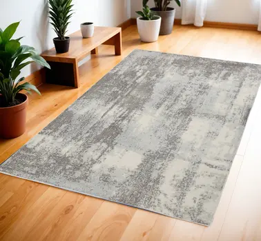 4' X 6' Gray Ivory and Light Blue Abstract Non Skid Area Rug