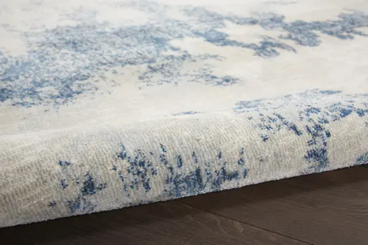 4' X 6' Light Blue and Ivory Abstract Non Skid Area Rug