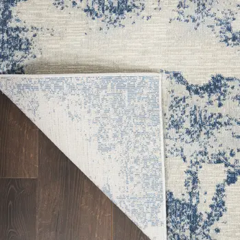 4' X 6' Light Blue and Ivory Abstract Non Skid Area Rug