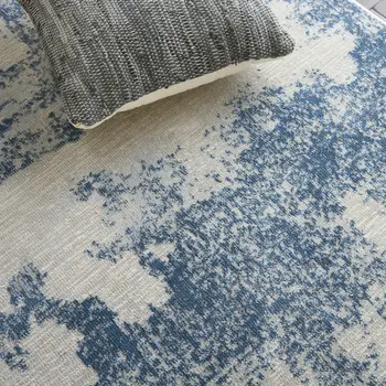 4' X 6' Light Blue and Ivory Abstract Non Skid Area Rug