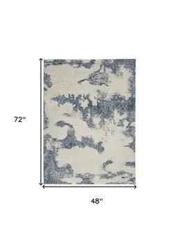 4' X 6' Light Blue and Ivory Abstract Non Skid Area Rug