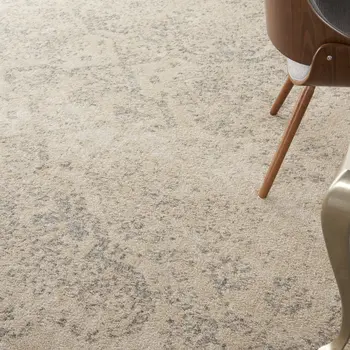 7' X 10' Beige And Gray Geometric Distressed Area Rug