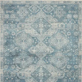 7' X 10' Ivory and Light Blue Geometric Distressed Area Rug