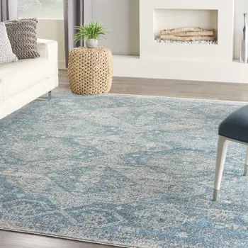 7' X 10' Ivory and Light Blue Geometric Distressed Area Rug