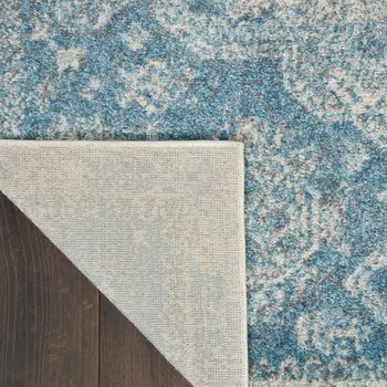 7' X 10' Ivory and Light Blue Geometric Distressed Area Rug