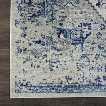 7' X 10' Ivory And Light Blue Floral Medallion Distressed Area Rug