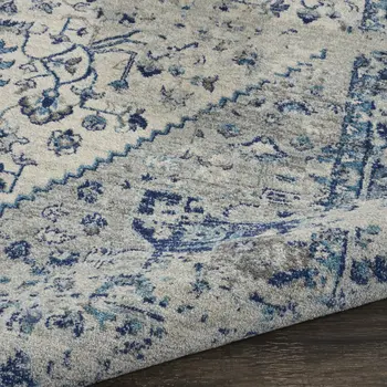 7' X 10' Ivory And Light Blue Floral Medallion Distressed Area Rug
