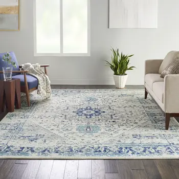 7' X 10' Ivory And Light Blue Floral Medallion Distressed Area Rug