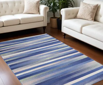 8' X 10' Ivory Tan and Blue Abstract Distressed Non Skid Area Rug