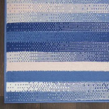 8' X 10' Ivory Tan and Blue Abstract Distressed Non Skid Area Rug