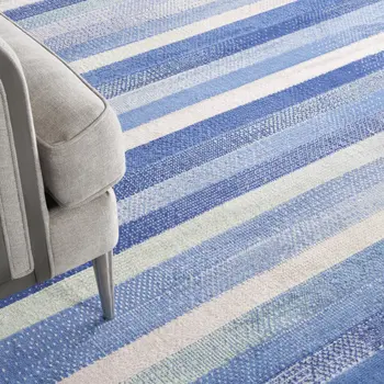 8' X 10' Ivory Tan and Blue Abstract Distressed Non Skid Area Rug