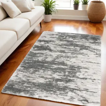 5' X 7' Charcoal and Ivory Abstract Shag Area Rug